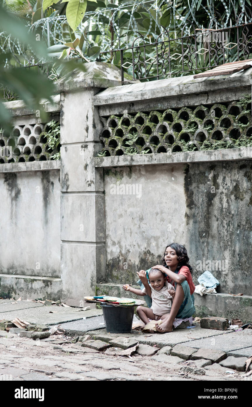 poverty children child on street in Myanmar Burma Rangoon Yangon Asia Stock Photo