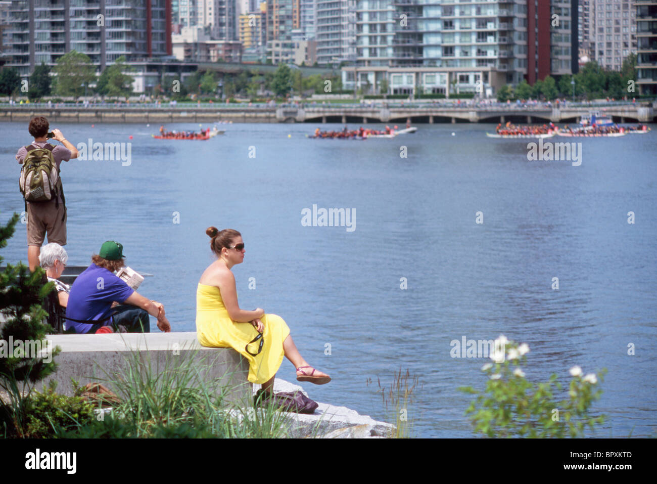 Vancouver, BC, British Columbia, Canada - Spectators watching Dragon Boat Race on False Creek Stock Photo