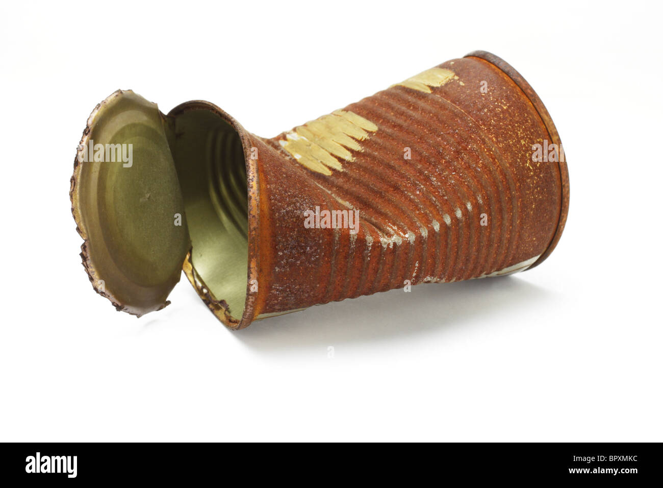 Old rusty crumbled tin can on white background Stock Photo
