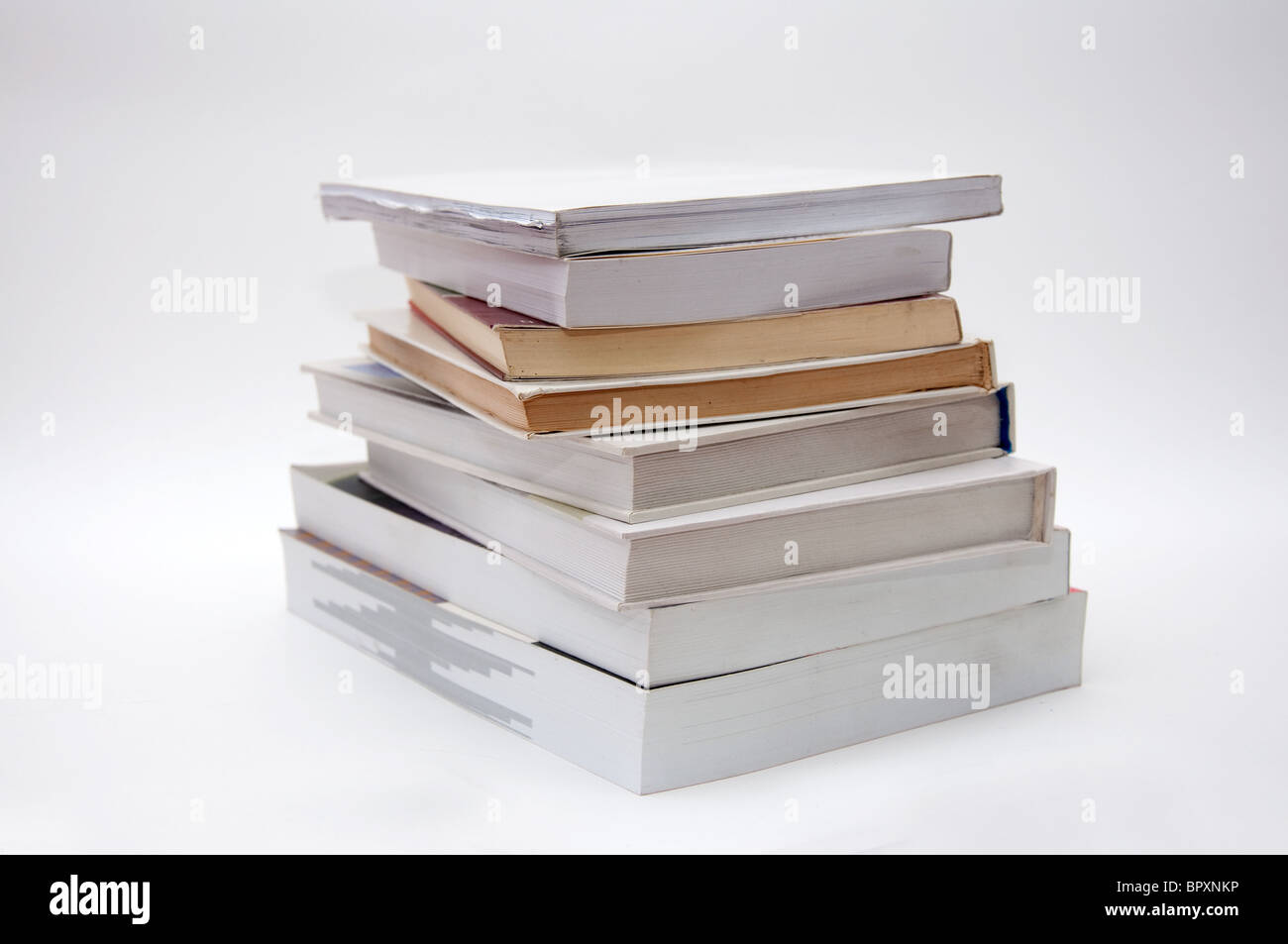 Stack of books over a white background Stock Photo