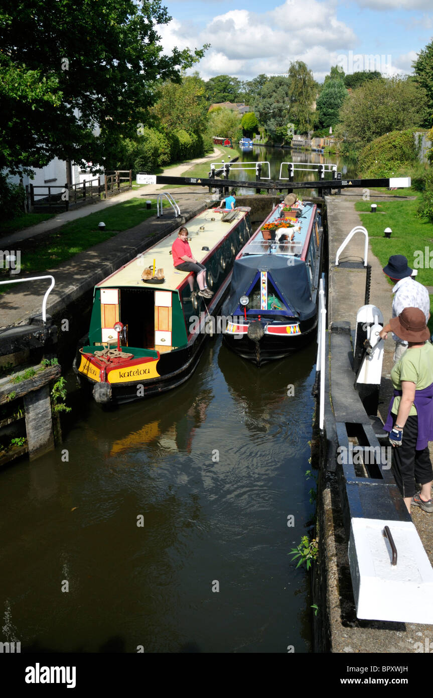 Two narrow boats in Apsley Lock 65 on the Grand Union Canal ...