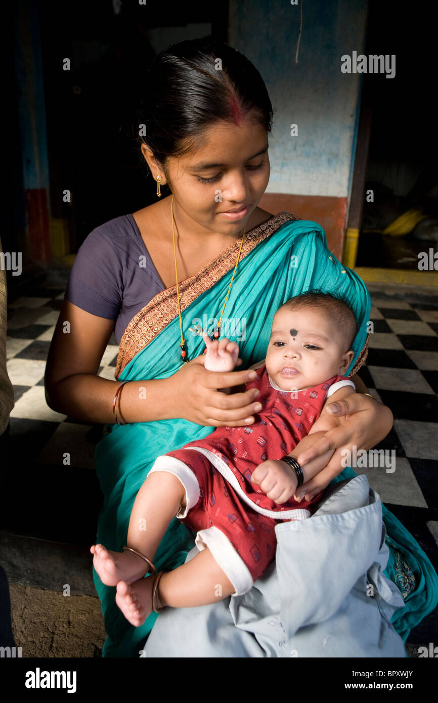 Young Indian Mother With H