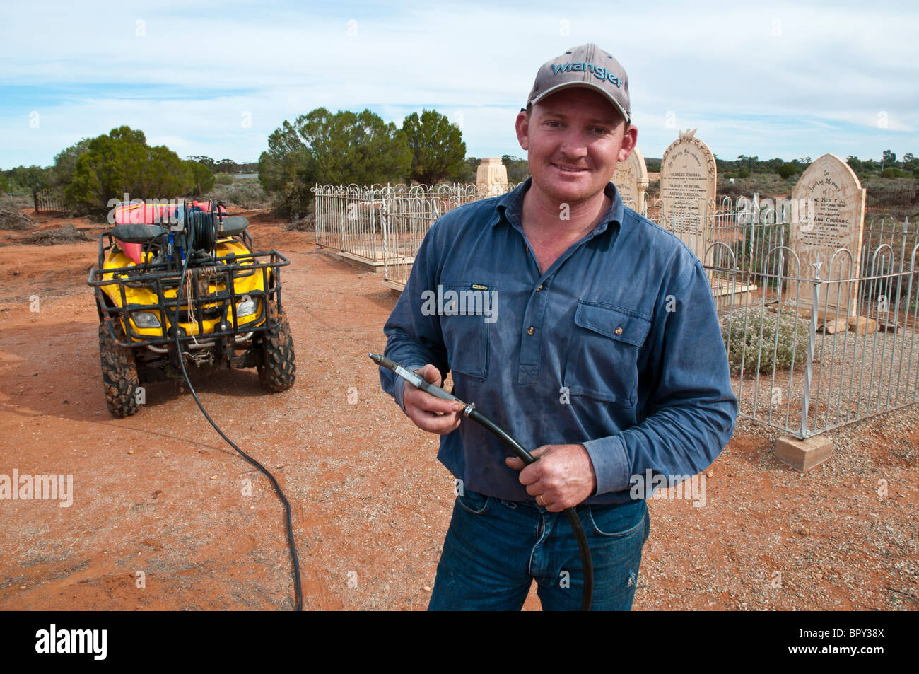 Herbicide sprayer in the historical cemetery at Silverton outside Broken Hill in outback New South Wales Stock Photo