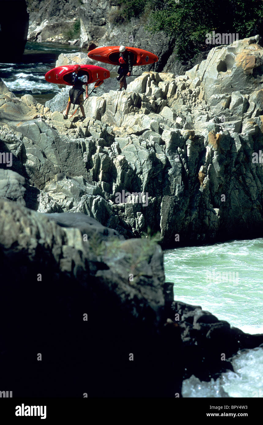 Kayakers portage a rapid, South Fork of the Payette River, Idaho Stock Photo