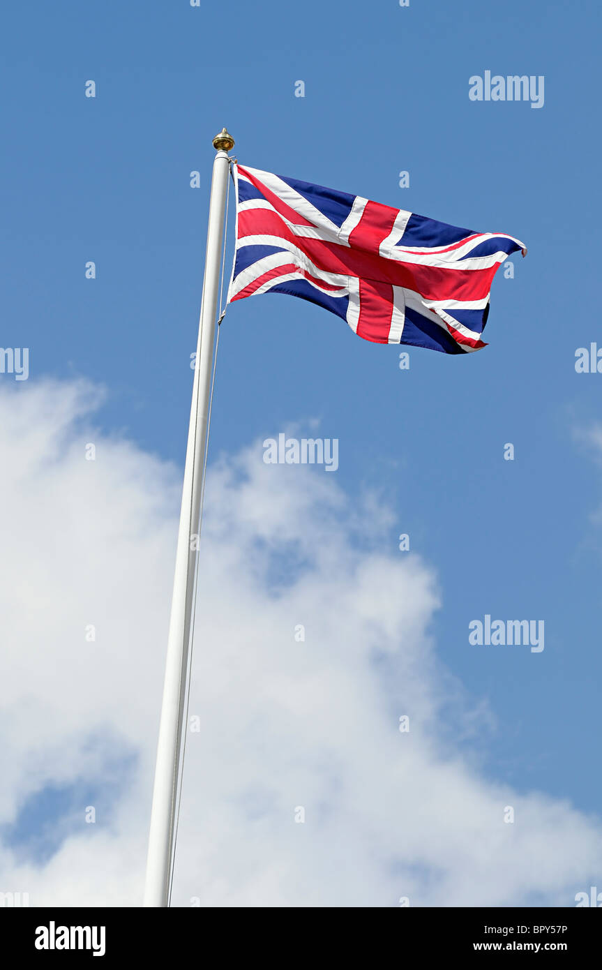 Union Jack Flag Against a Blue Sky Stock Photo