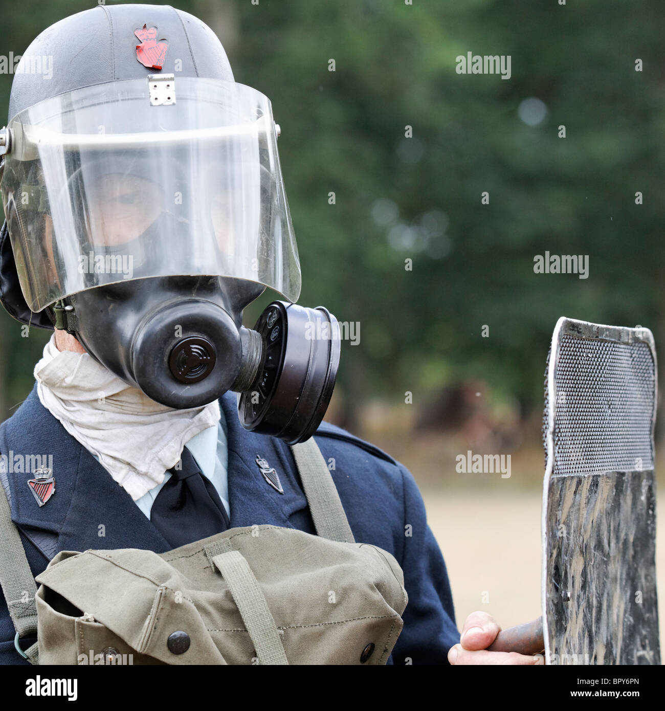 Northern Ireland Police Officer in Riot Gear with Gas Mask and Shield