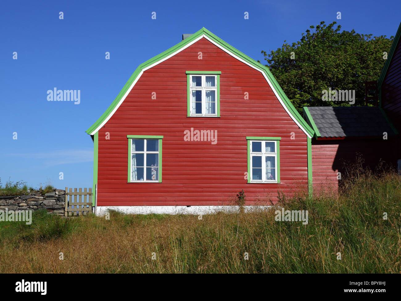 TIMBERED HOUSE ON THE NORWEGIAN ISLAND ON KINN.  SCANDANAVIA Stock Photo