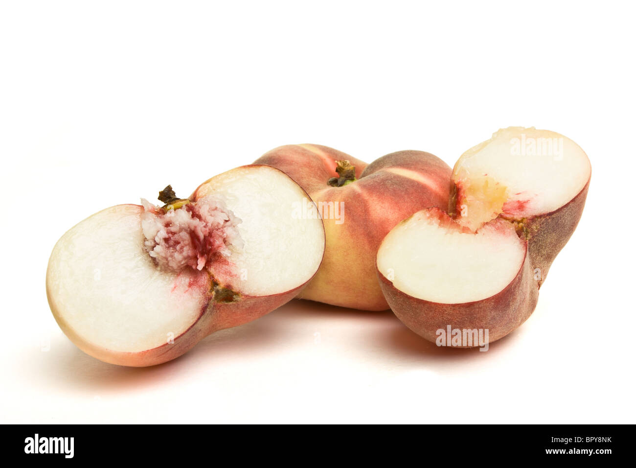 Exotic Flat peach also known as donut, chinese or saturn peach. Stock Photo