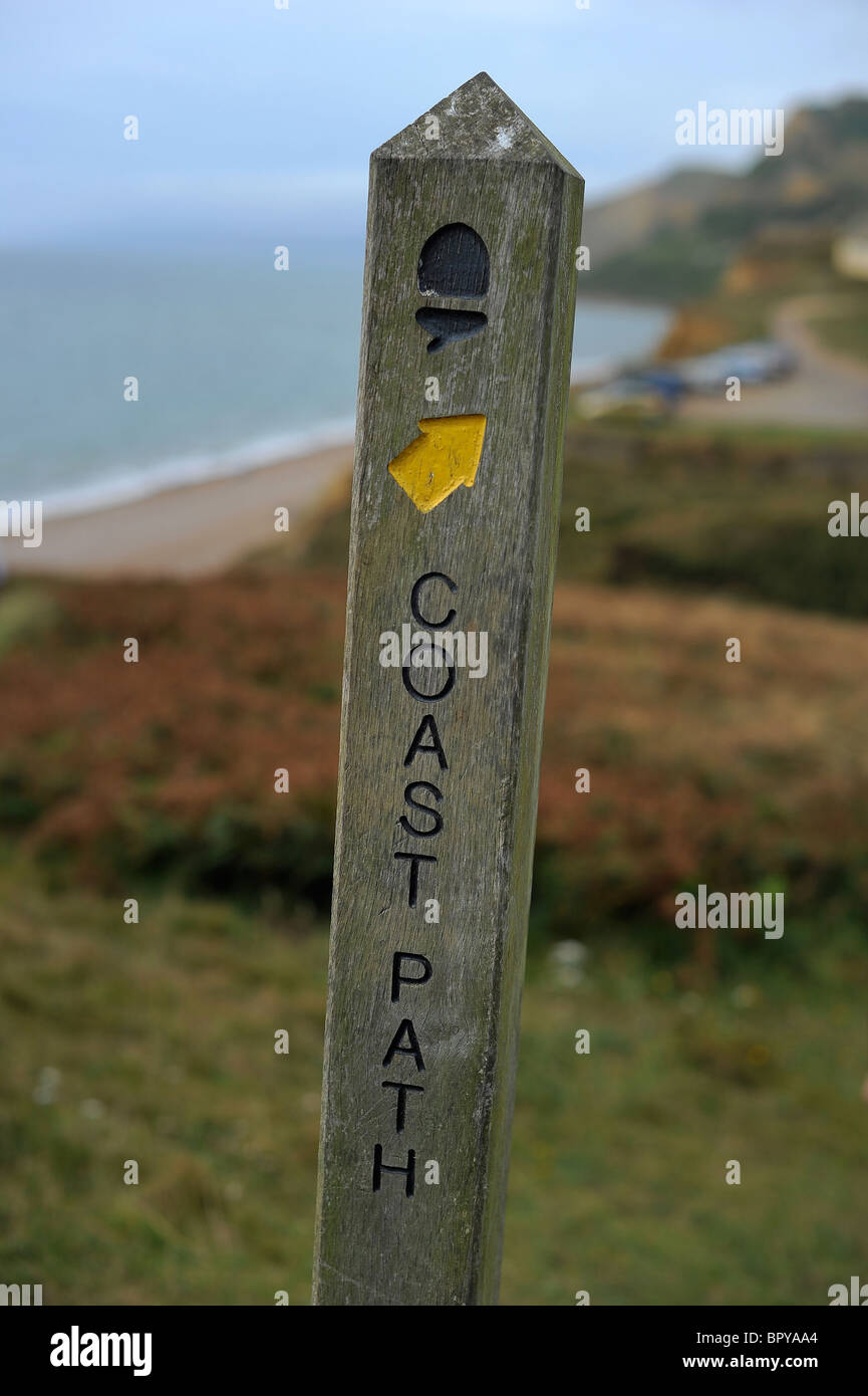 a sign post with Coast path written on, taken on the coast path between West Bay and Seatown, South Devon, Stock Photo