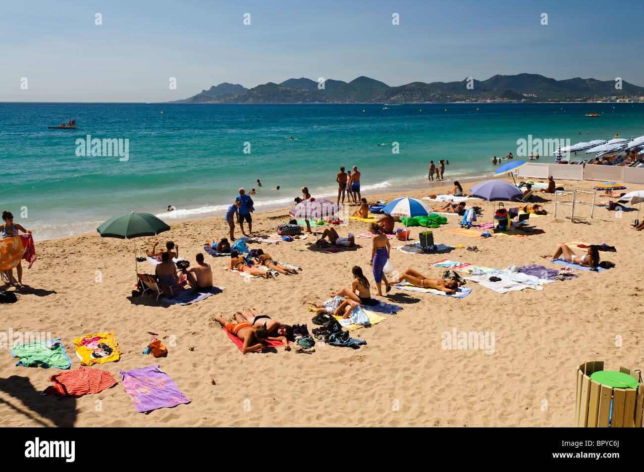 People sunbathing on the beach at Cannes, France Stock Photo Alamy
