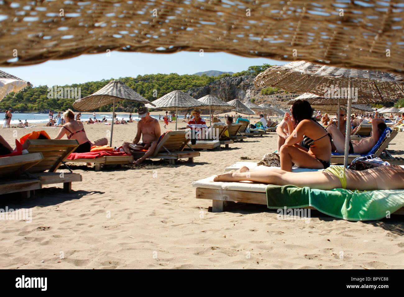 Wicker beach umbrellas, Dalyan, Turkey Stock Photo