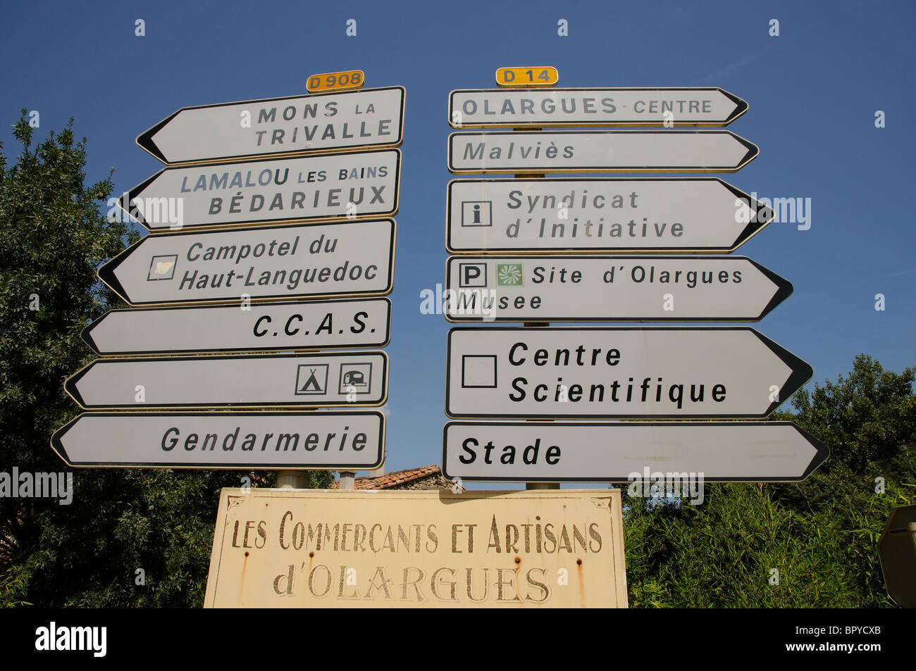 Roadside Signposts Roadside signpost against a blue sky southern France Stock Photo - Alamy