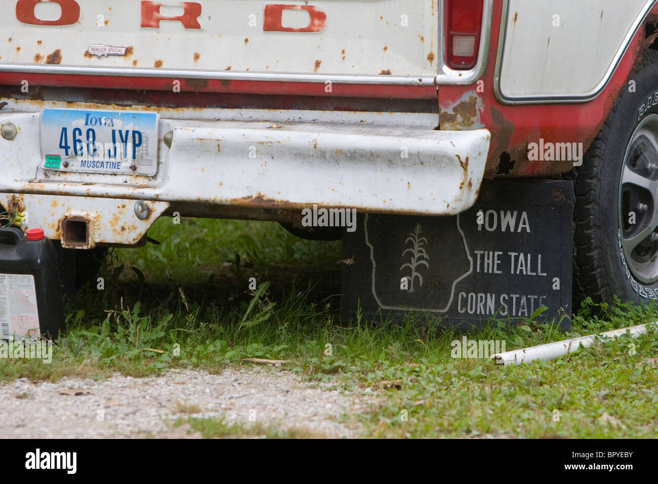 An old pickup truck in Iowa with Iowa mudflaps. Stock Photo
