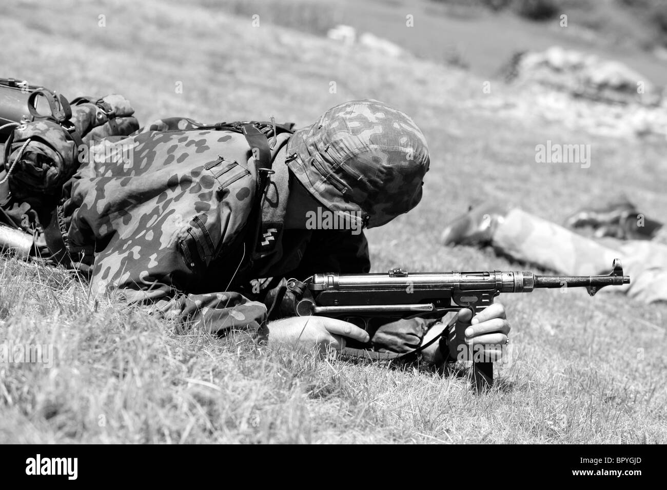 Soldier of the Waffen SS with his MP40 Submachine gun in Normandy 1944 ...