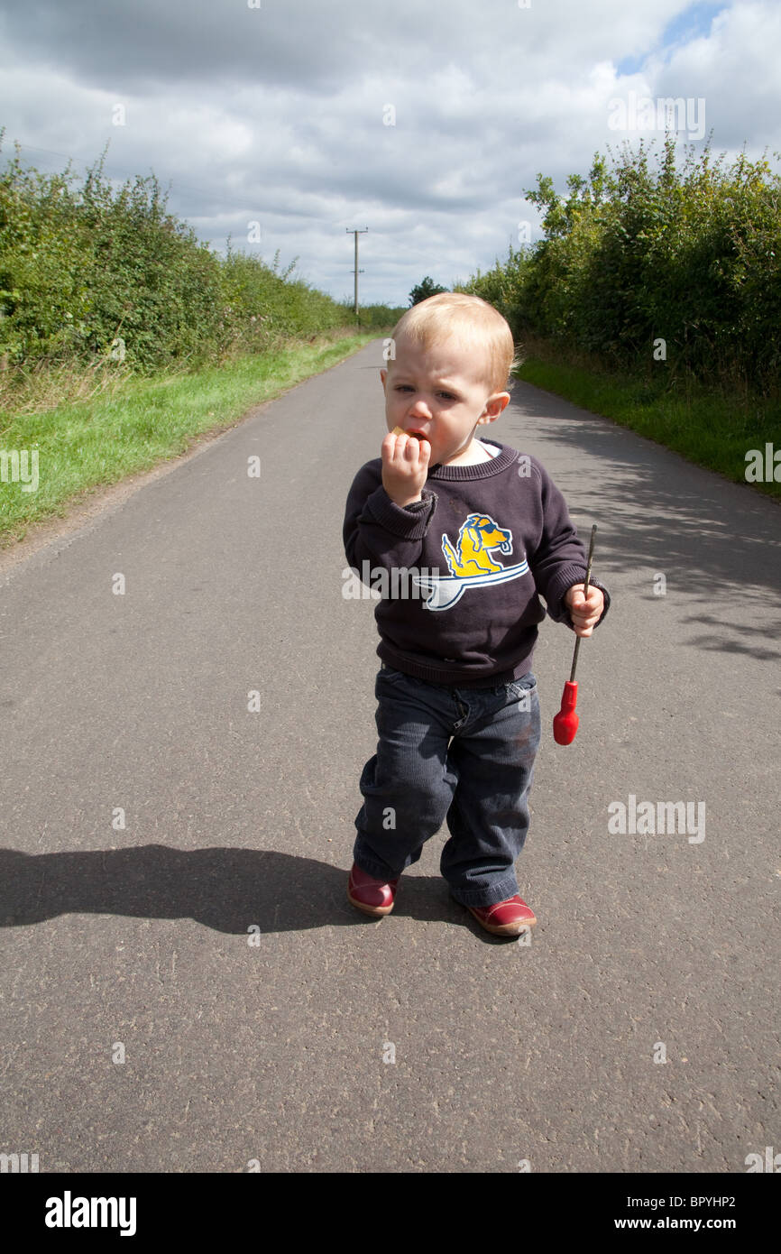 One year old boy outside, Hattingley, Hampshire, England, United Kingdom. Stock Photo