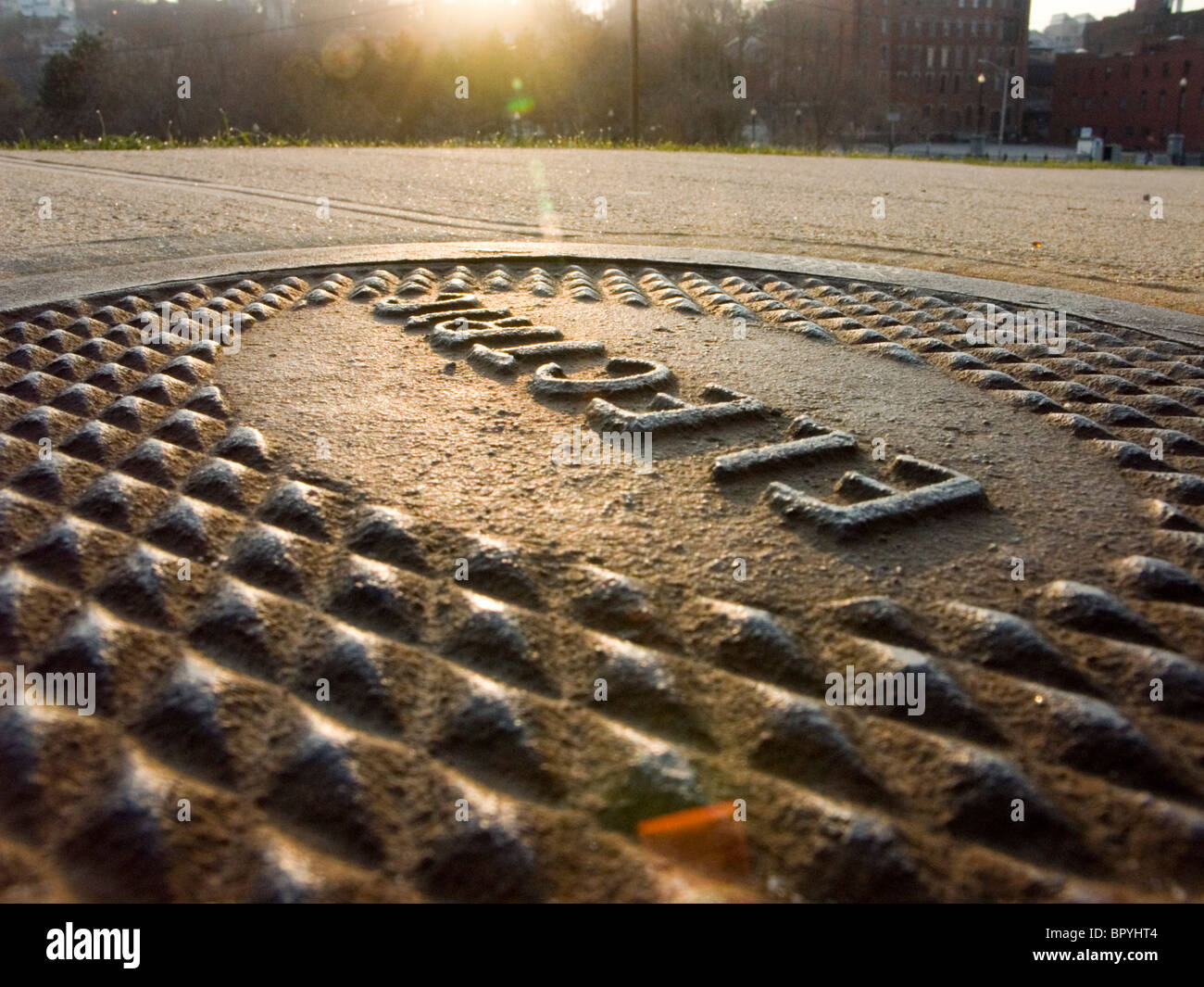 Utility service hole covers in Providence Stock Photo Alamy