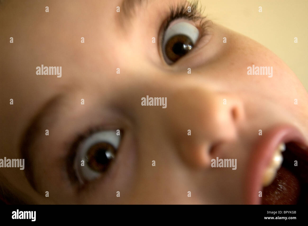A young girl makes a silly face Stock Photo