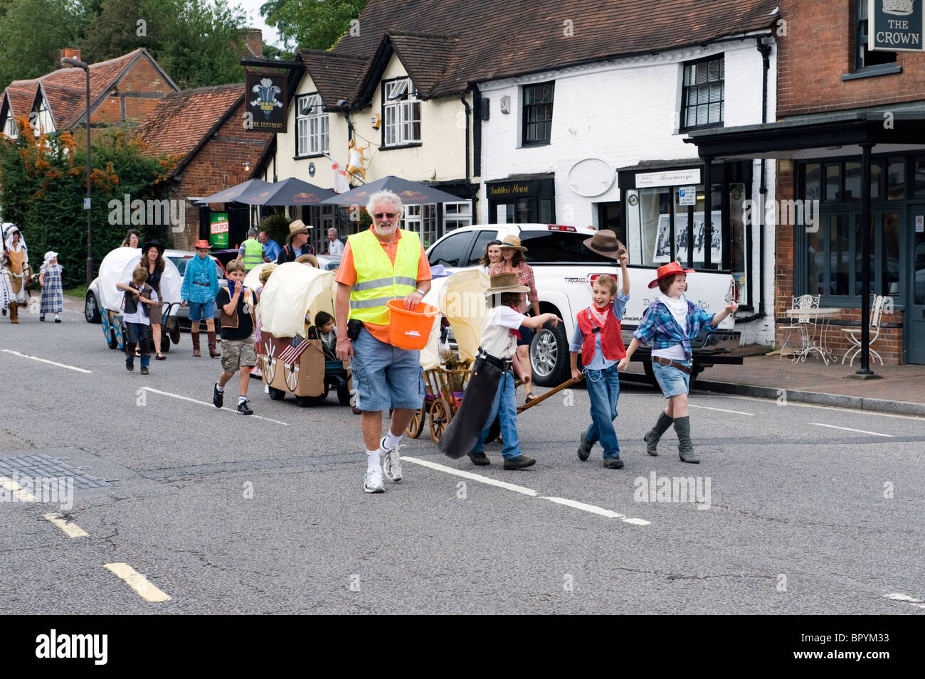 A village parade of people in Chalfont St Giles Stock Photo Alamy