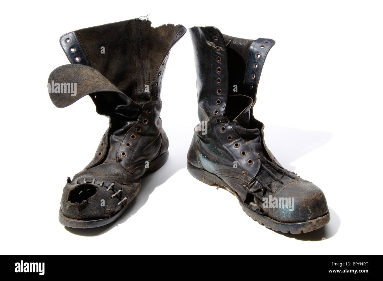 Well worn leather boots Cut Out Stock Images & Pictures - Alamy