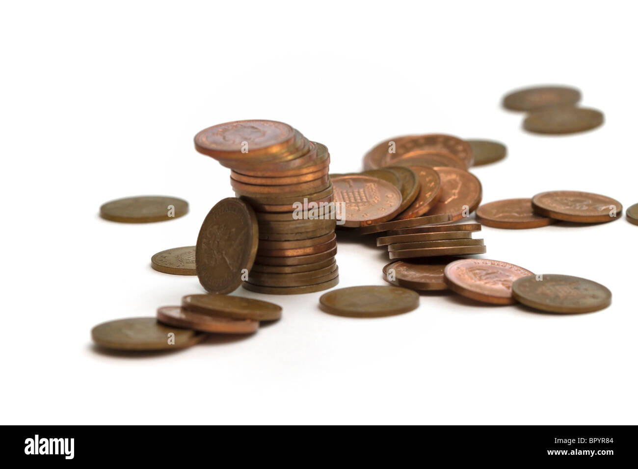 Fallen stack of pennies Stock Photo