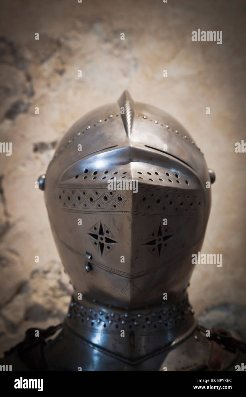 Segovia, Segovia Province, Spain. 14th or 15th century bascinet style visored helmet on display in the Alcazar Stock Photo