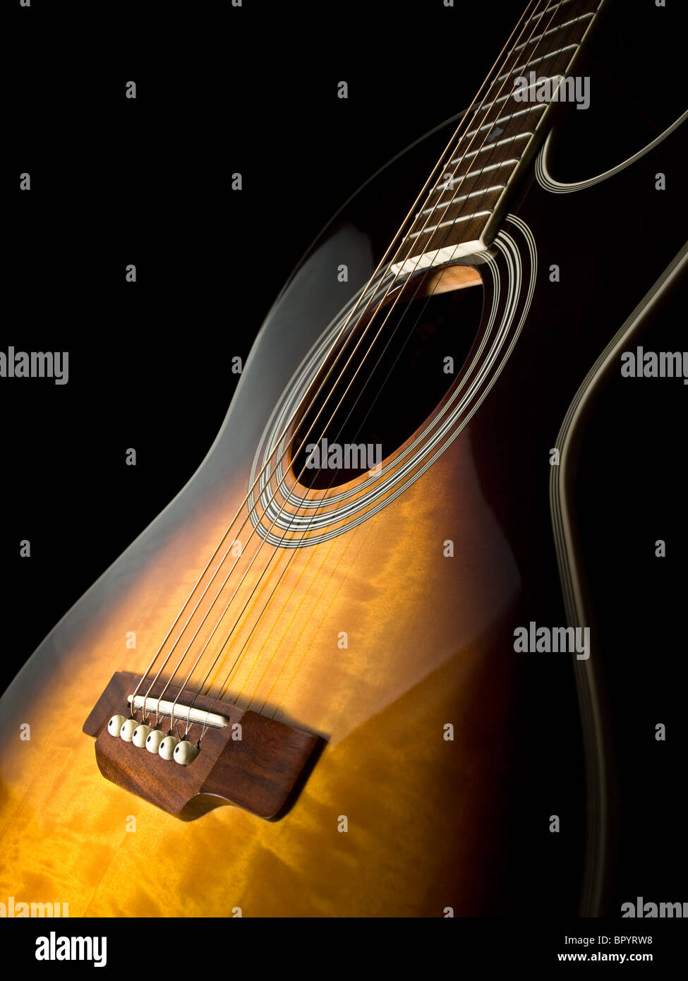 acoustic guitar over black background , closeup shot Stock Photo