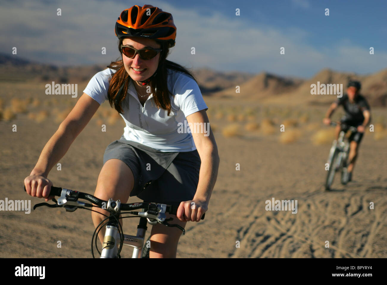 Two mountain bikers near Dumont Desert, California. Stock Photo