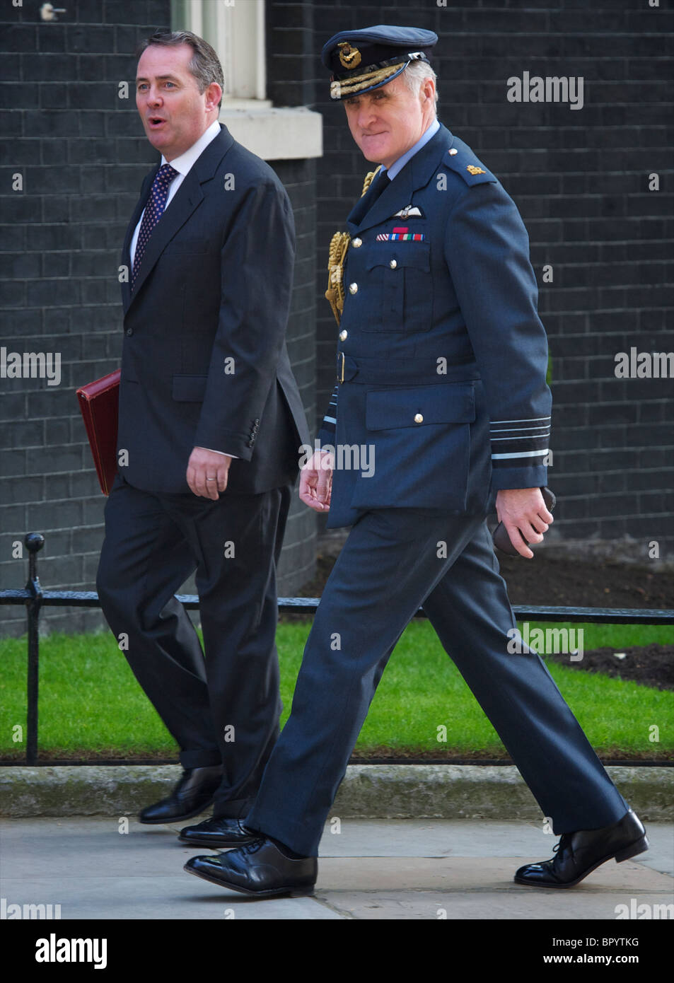 Secretary of State for Defence - Liam Fox Conservative) and Air Chief Marshal Sir Graham Eric Stirrup arriving at Downing Street Stock Photo