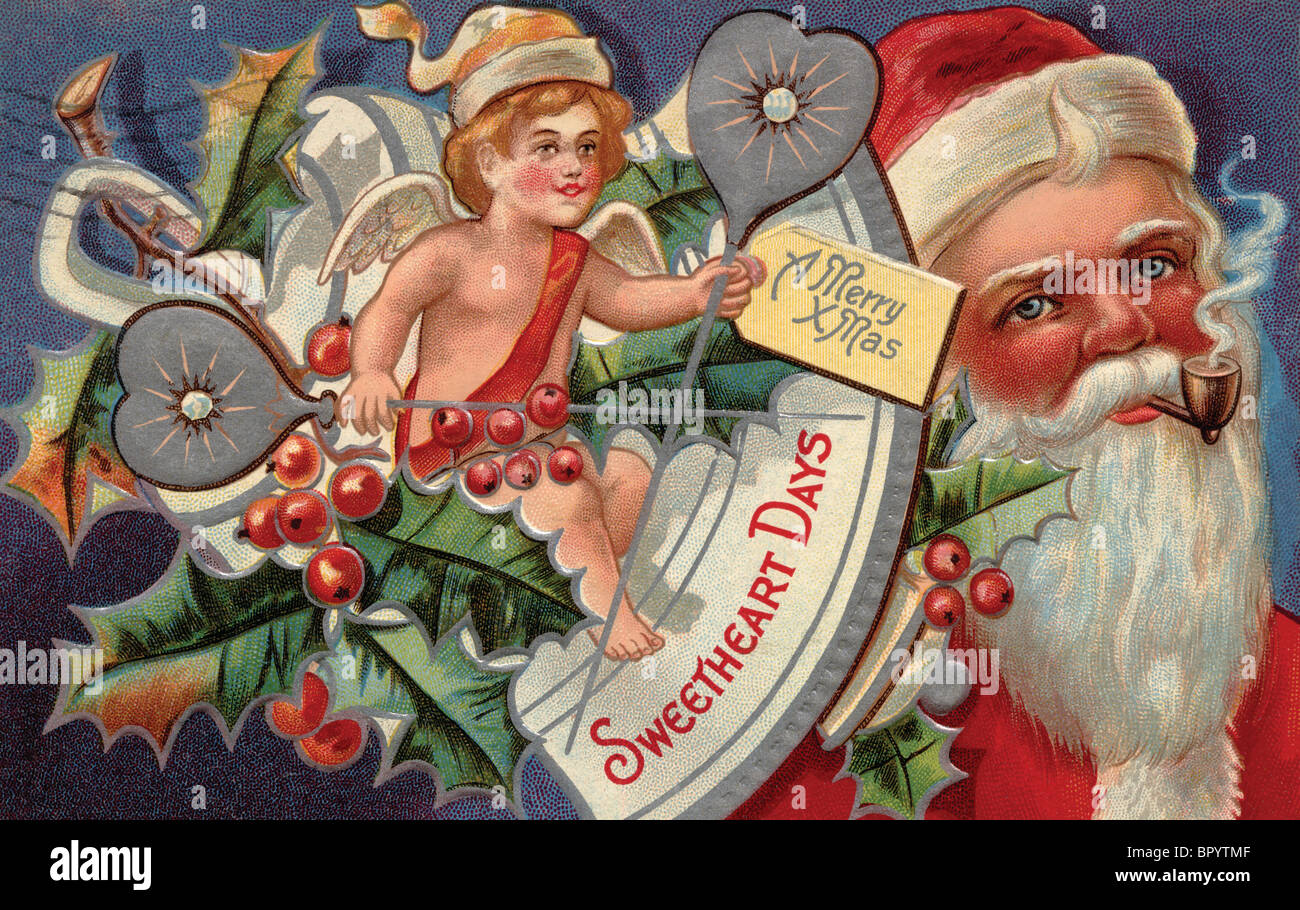 Vintage Christmas postcard of a cherub and Santa Claus in the background Stock Photo