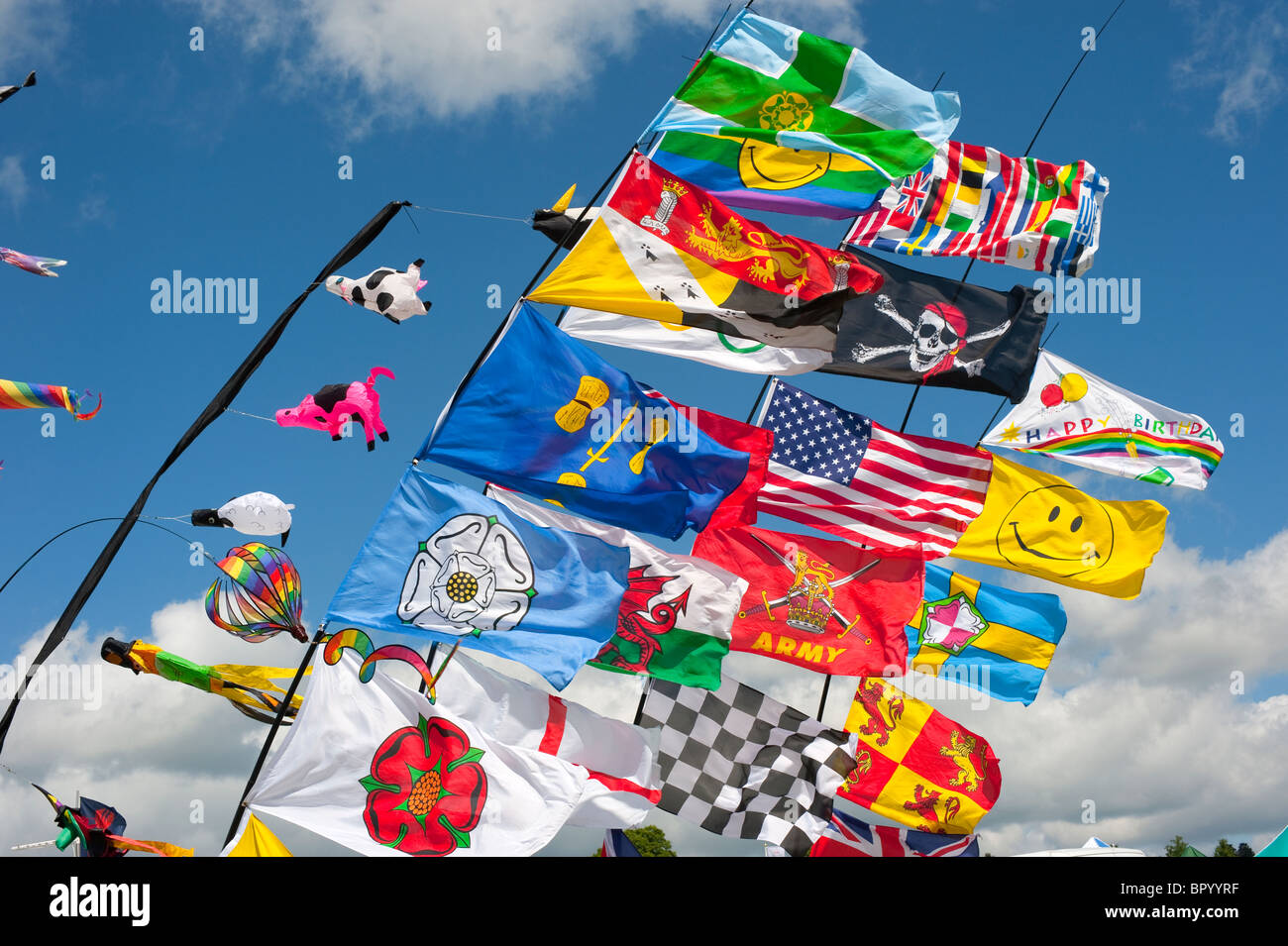 Bright colourful fun flags blue sky bold Stock Photo Alamy
