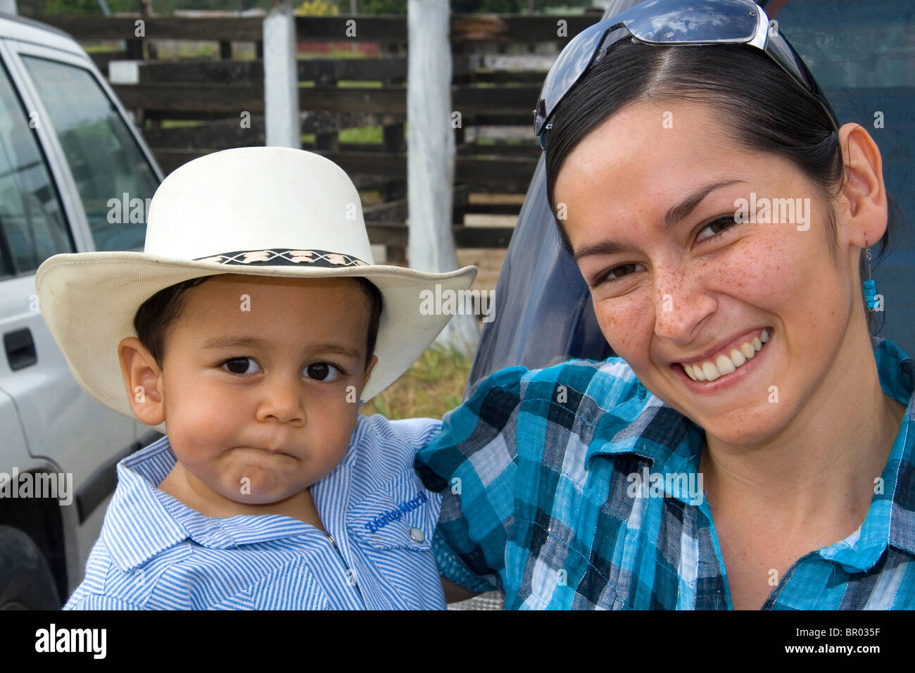 Costa Rican mother and son on a ranch at Liberia, Costa Rica. MR Stock Photo