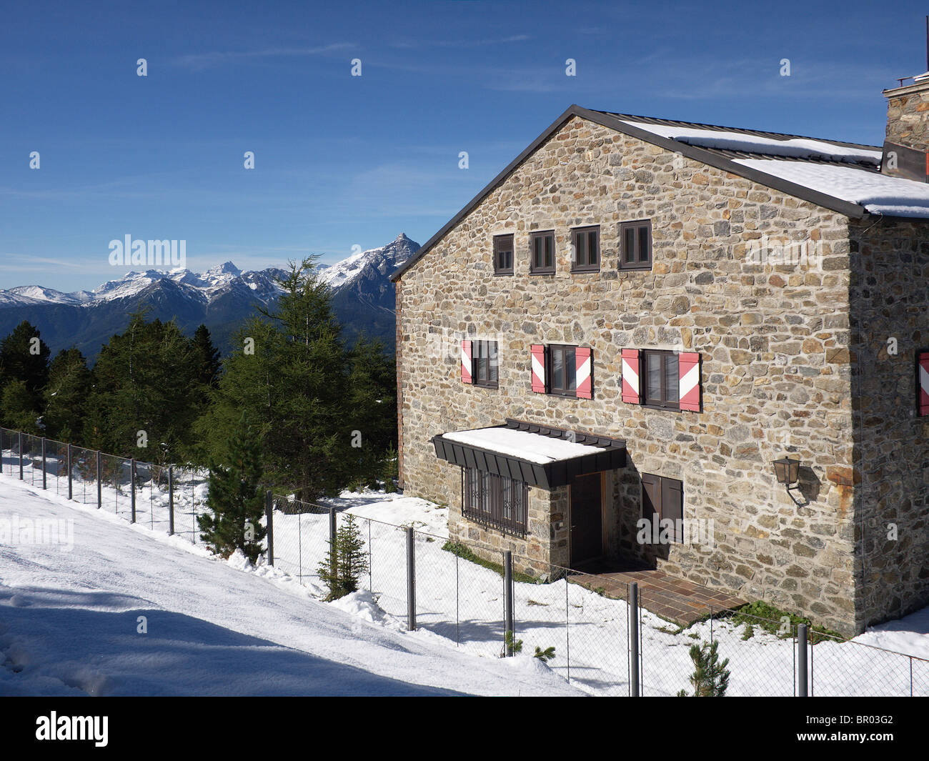 Klimahaus hut in early season snowfall  September on the Patscherkofel mountain near Innsbruck Stock Photo