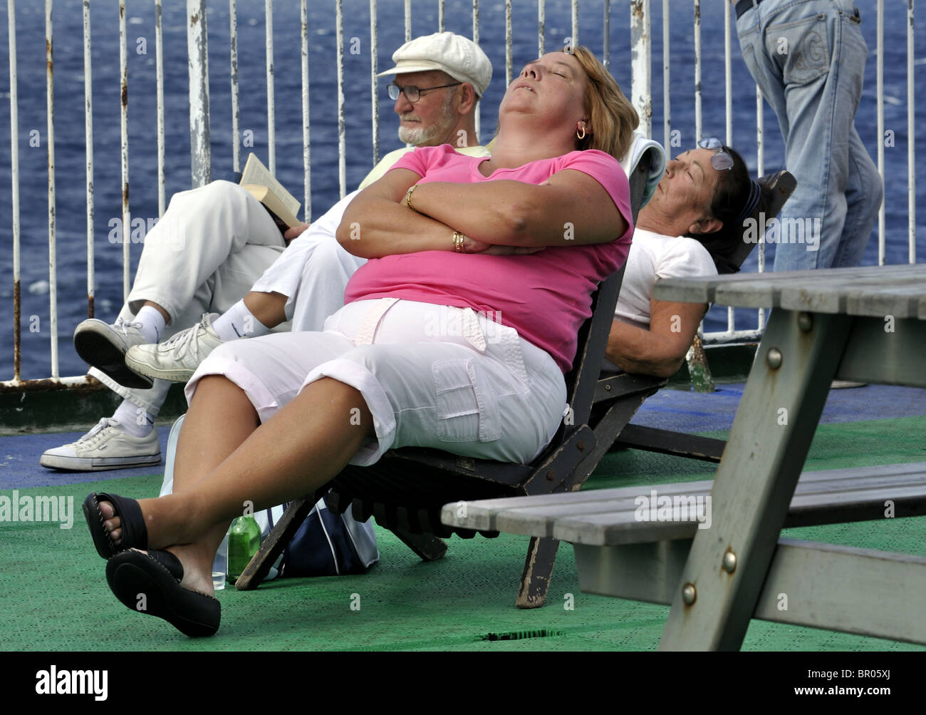 Passengers sleeping on deck on hi-res stock photography and images - Alamy