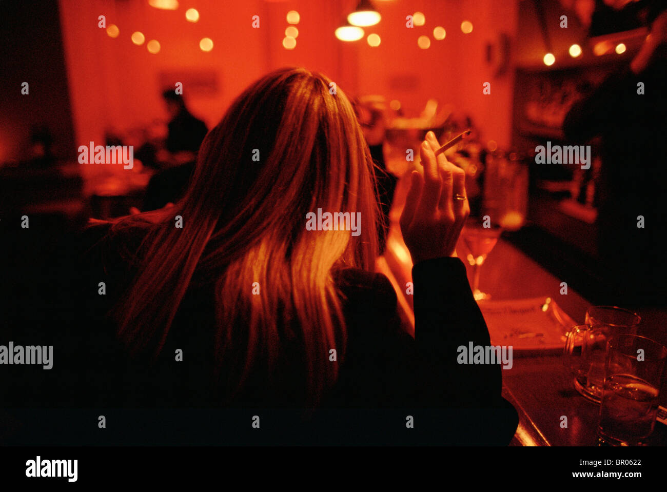 smoking in a bar Stock Photo