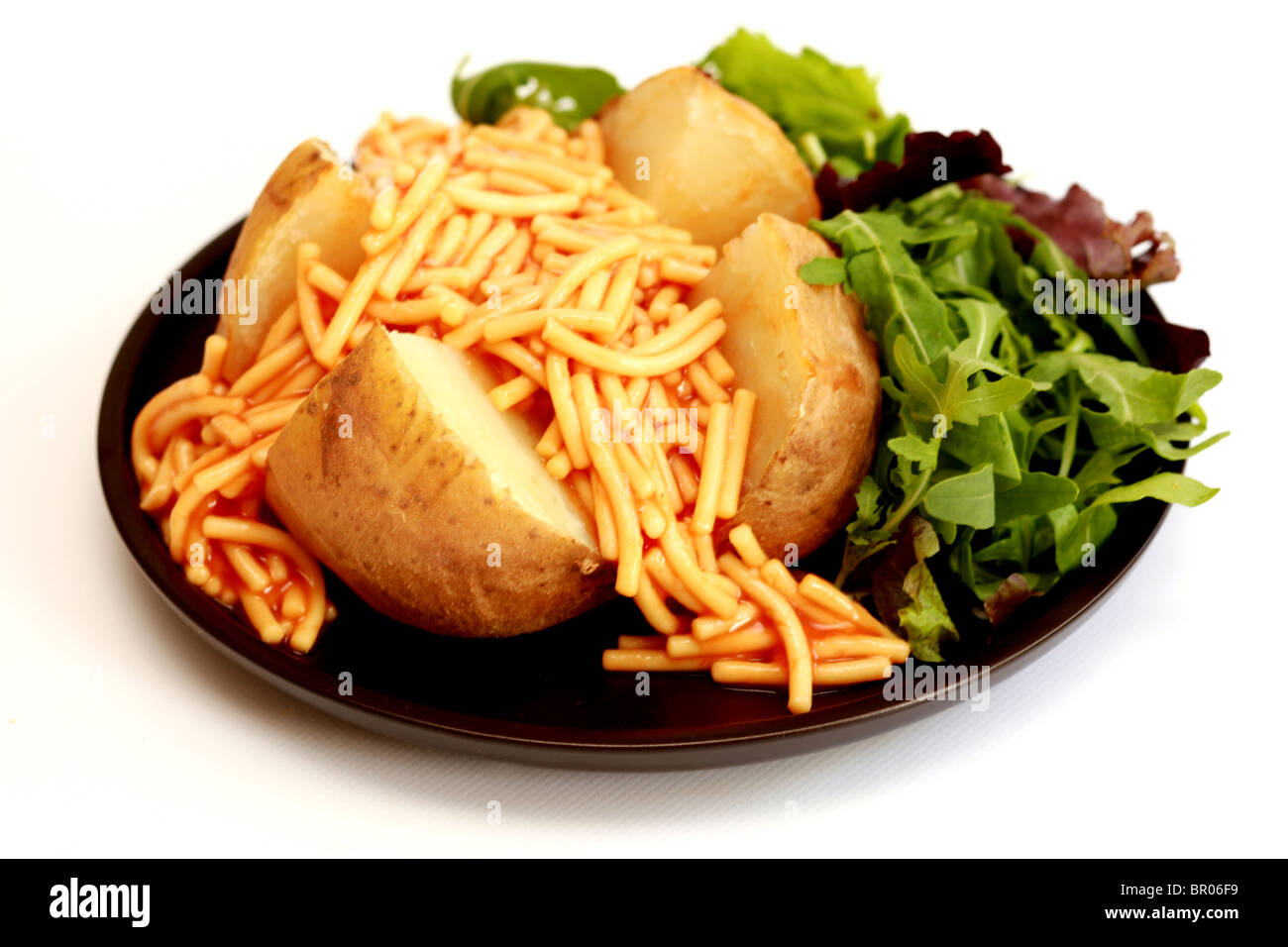 Jacket Potato with Spaghetti Stock Photo Alamy