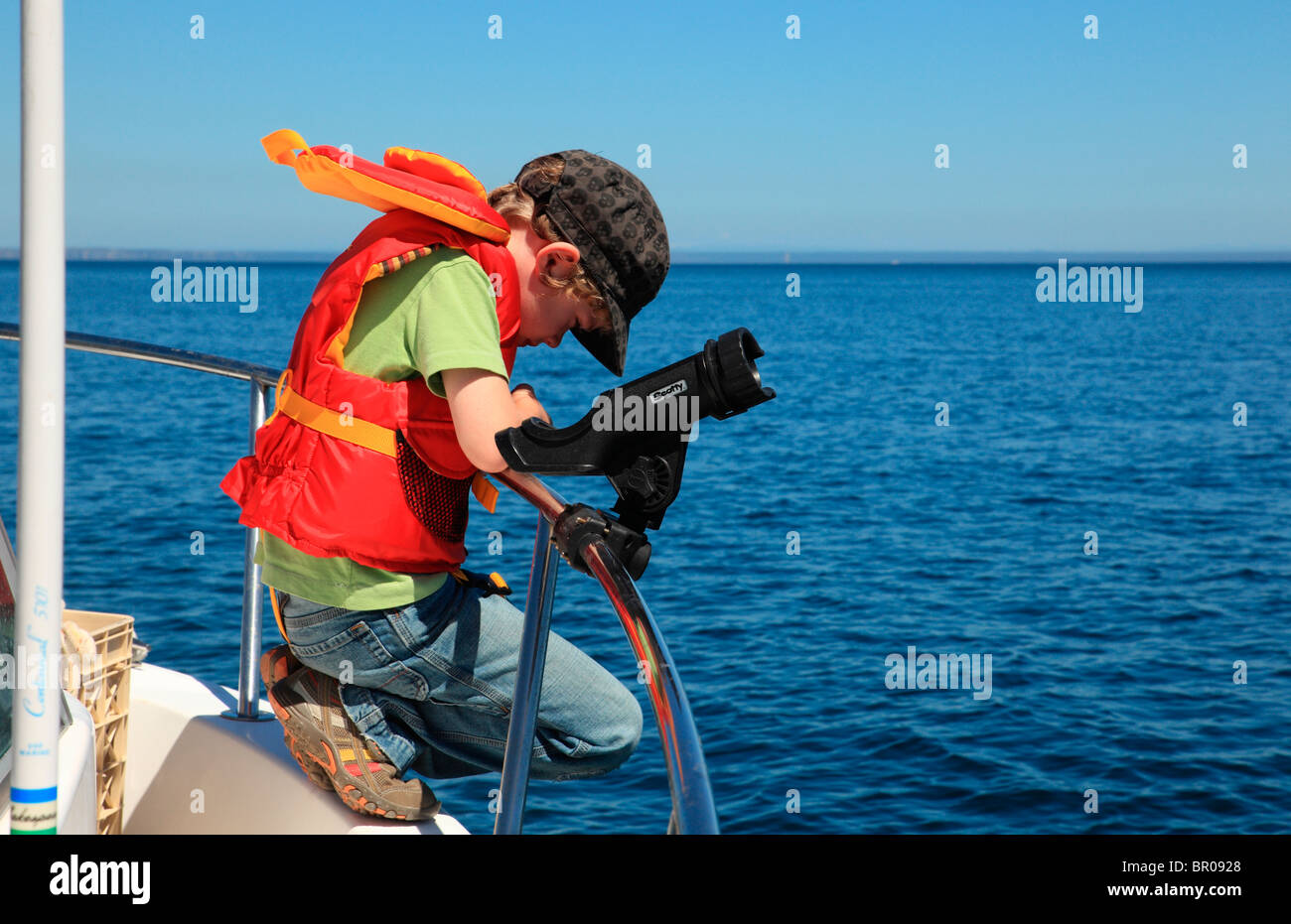 Young boy boating Stock Photo