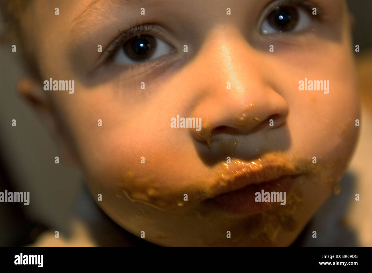 African boy eating peanut butter hires stock photography and images