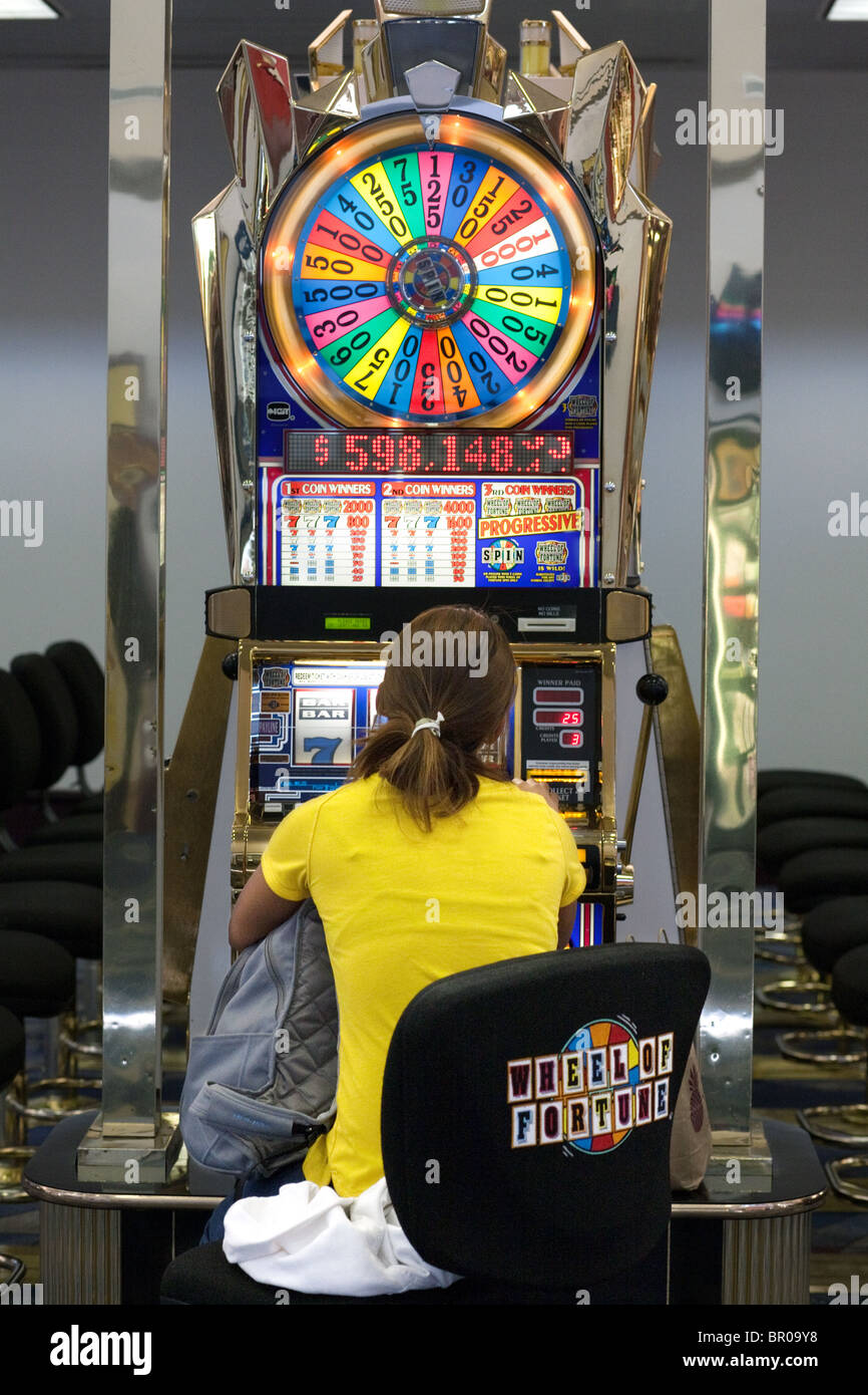 Las Vegas, NV, USA - 13th July 2013: People Playing Slot Machine Games  Inside Las Vegas Casino. Stock Photo, Picture and Royalty Free Image. Image  26254649.