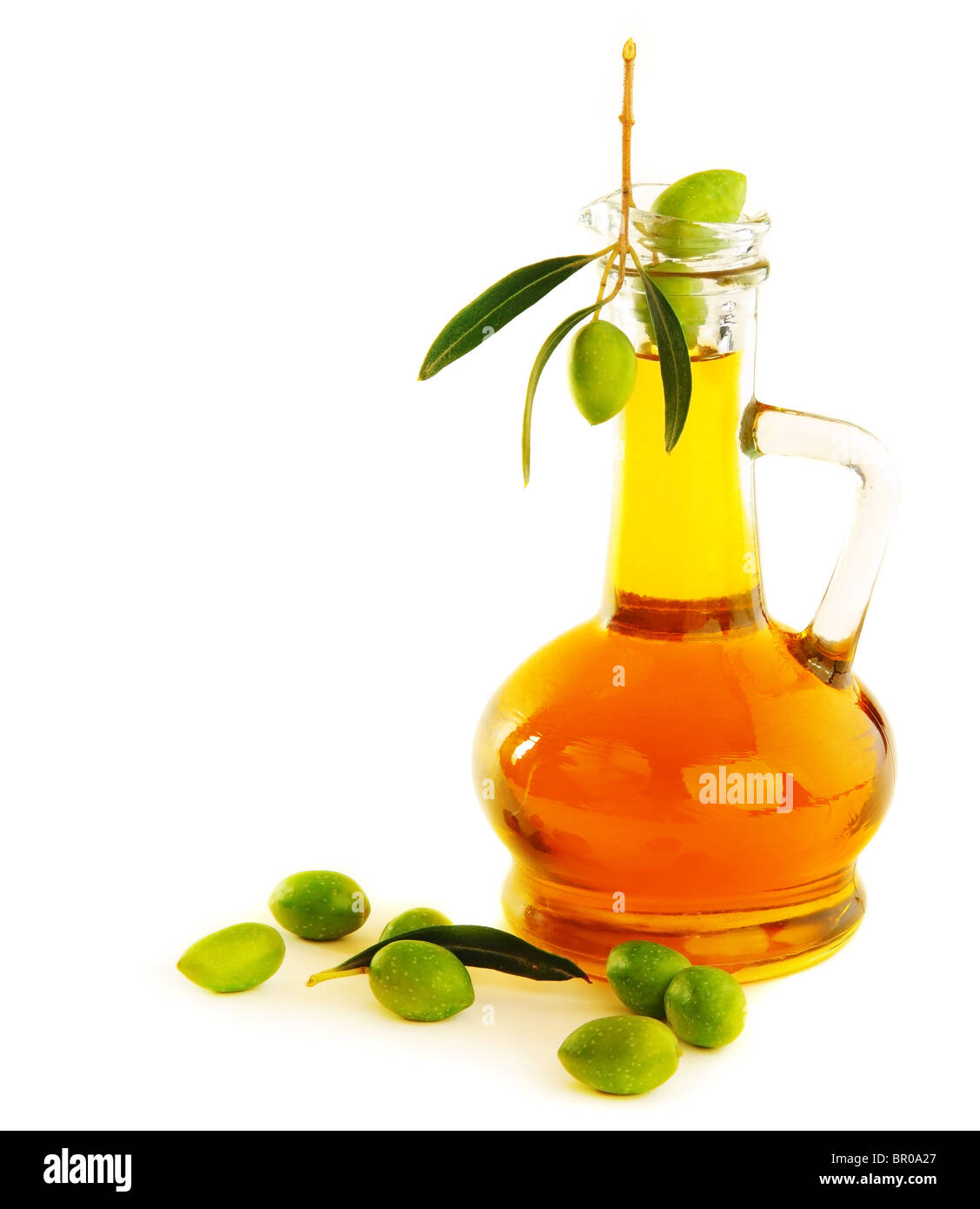 Fresh green olives & oil isolated on white background Stock Photo - Alamy