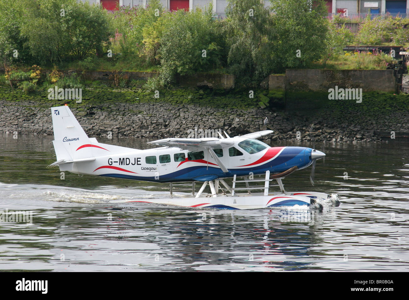 Sea Plane prepairing for take off on the River Clyde in Glasgow. Stock Photo