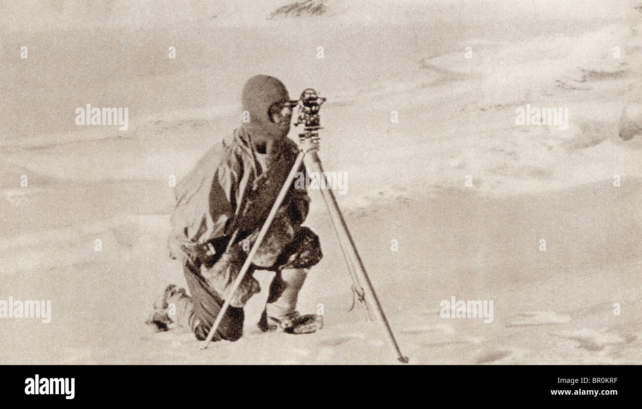 Captain Evans observing with the theodolite used by Captain Scott to fix position of the South Pole. Stock Photo