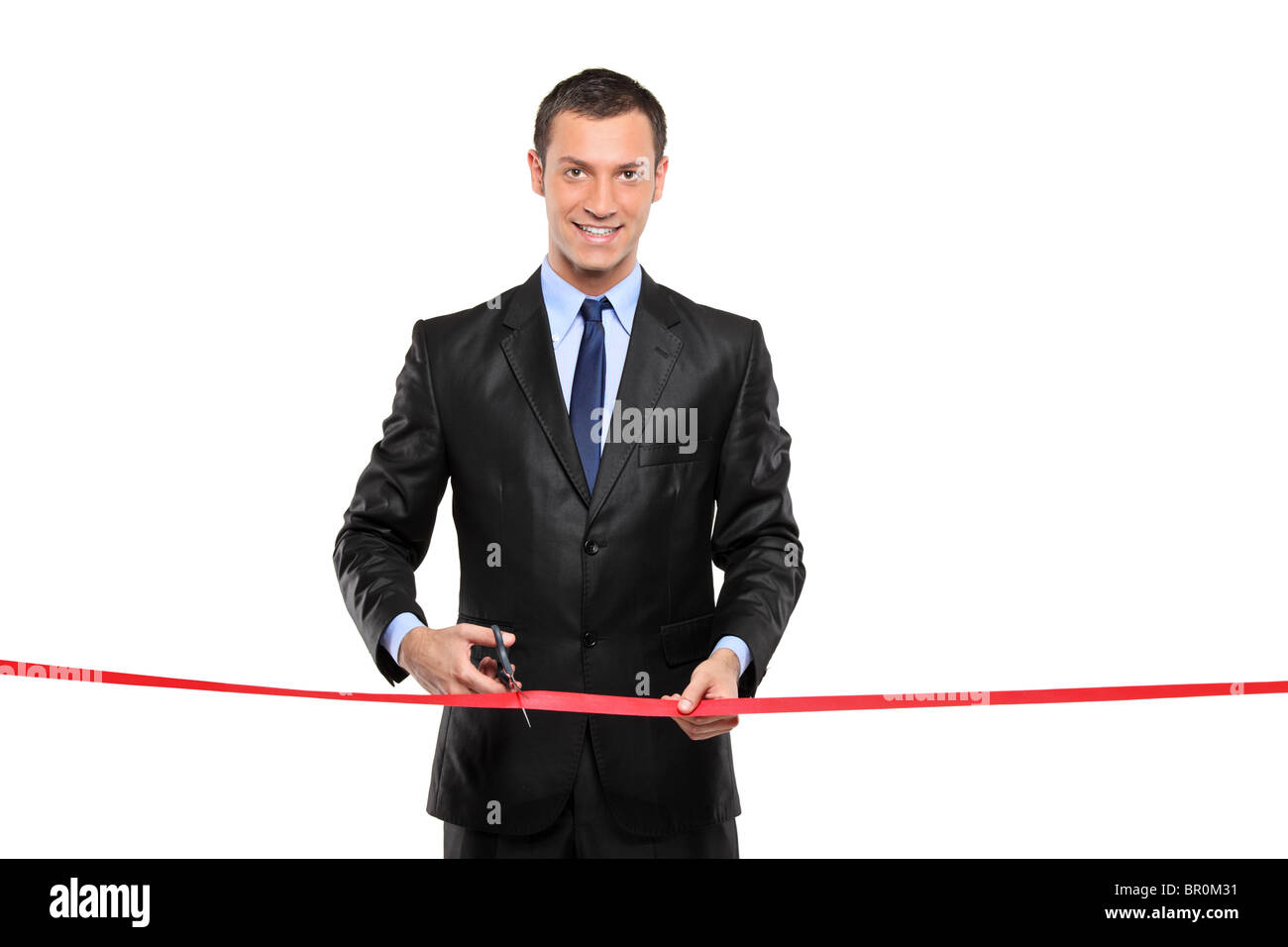 A man cutting a red ribbon, opening ceremony Stock Photo