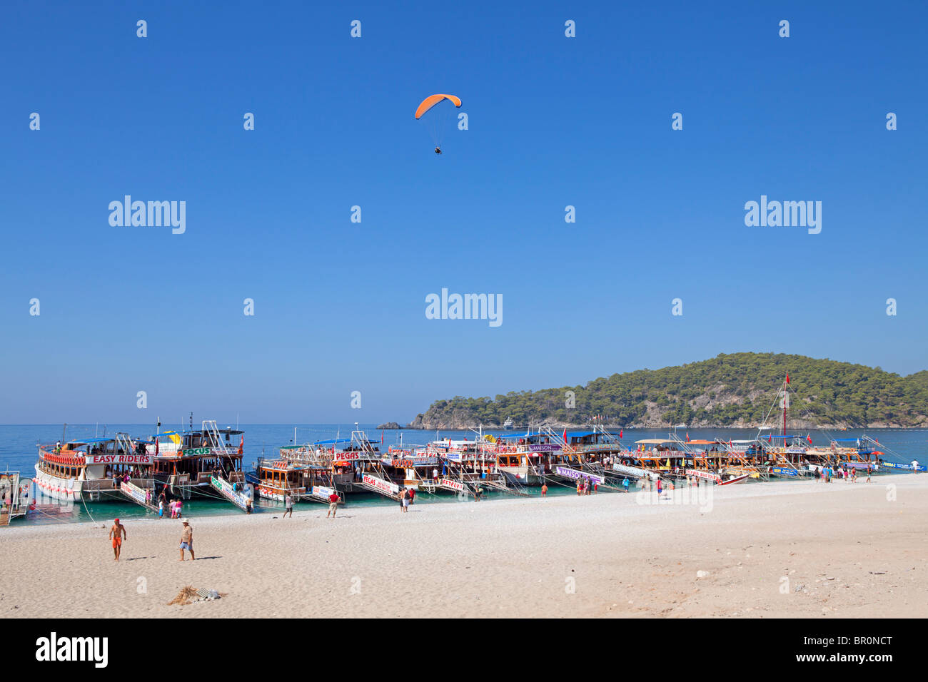 paraglider and excursion boats at Ölüdeniz Bay near Fethiye at the