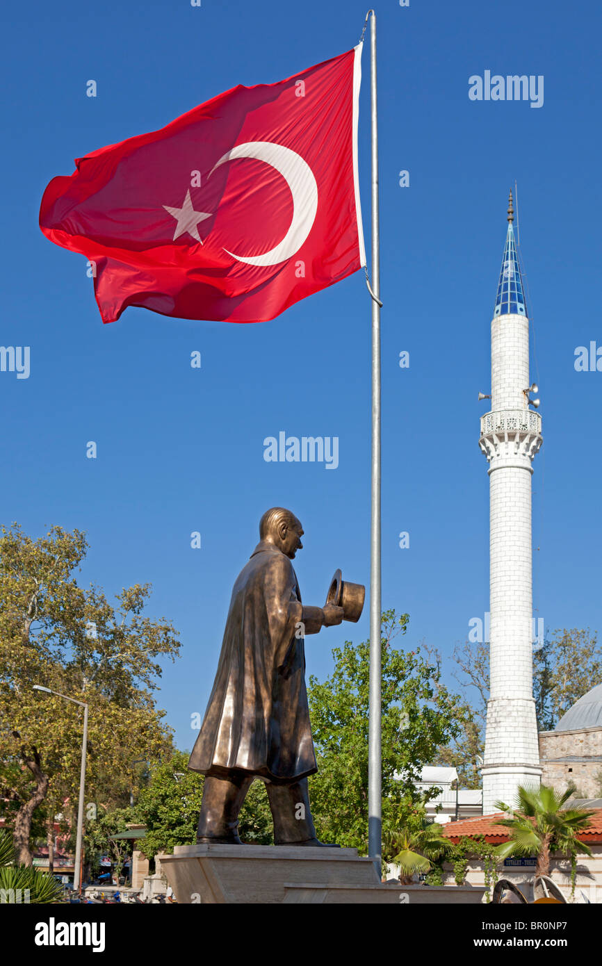 Atatürk Statue, minaret and Turkish Flag at Dalyan, Dalyan Delta, Turkish Aegean Sea, Turkey Stock Photo