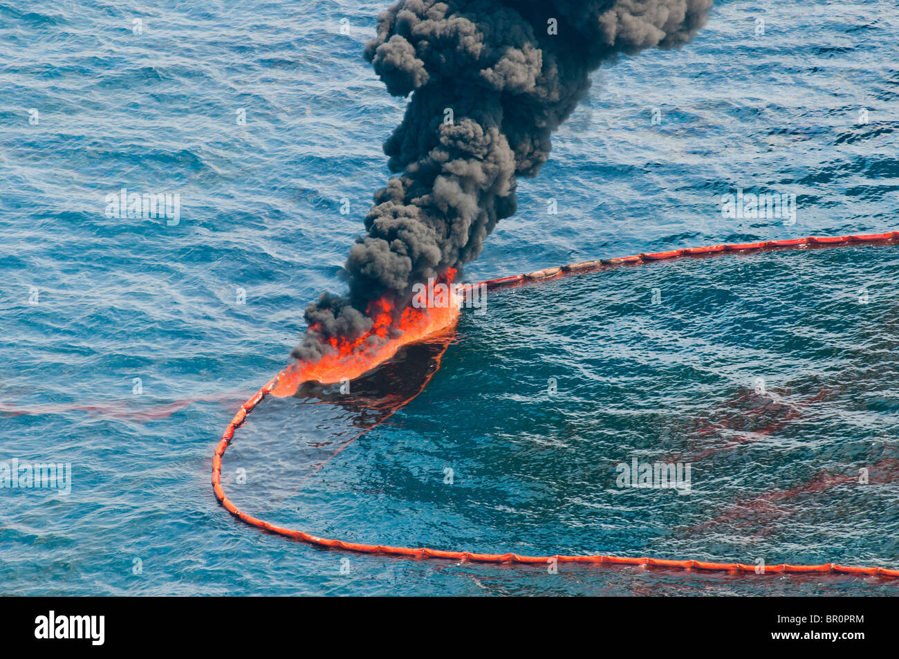 Insitu burn, seven miles north of the source MC 252 site, Gulf of Mexico, Louisiana, USA. Stock Photo