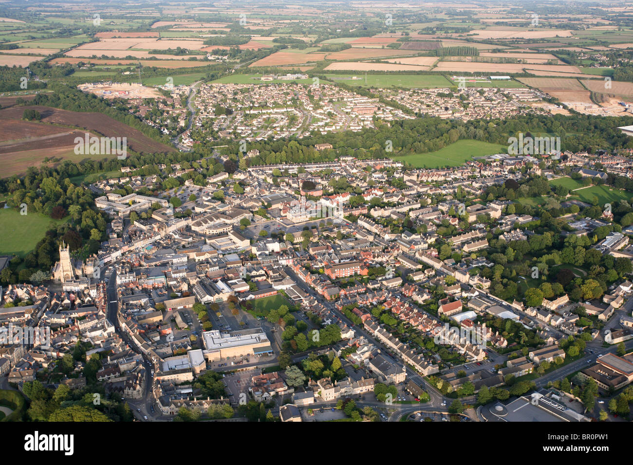 An aerial view of the Cotswold town of Cirencester, Gloucestershire from the south west Stock