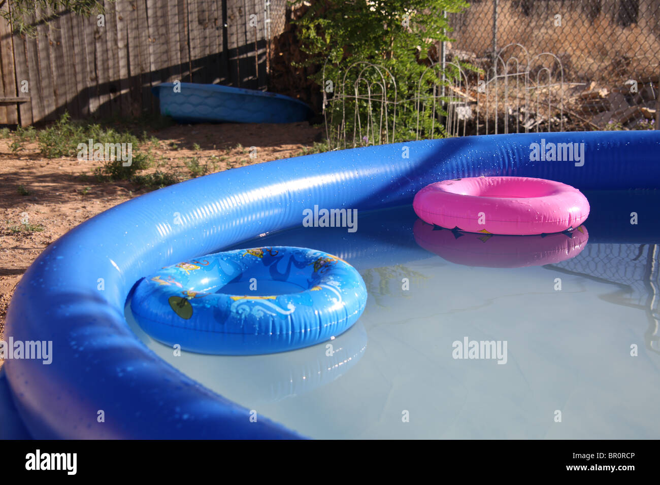Children's swimming pool with floats in a backyard in Rio Rancho, New