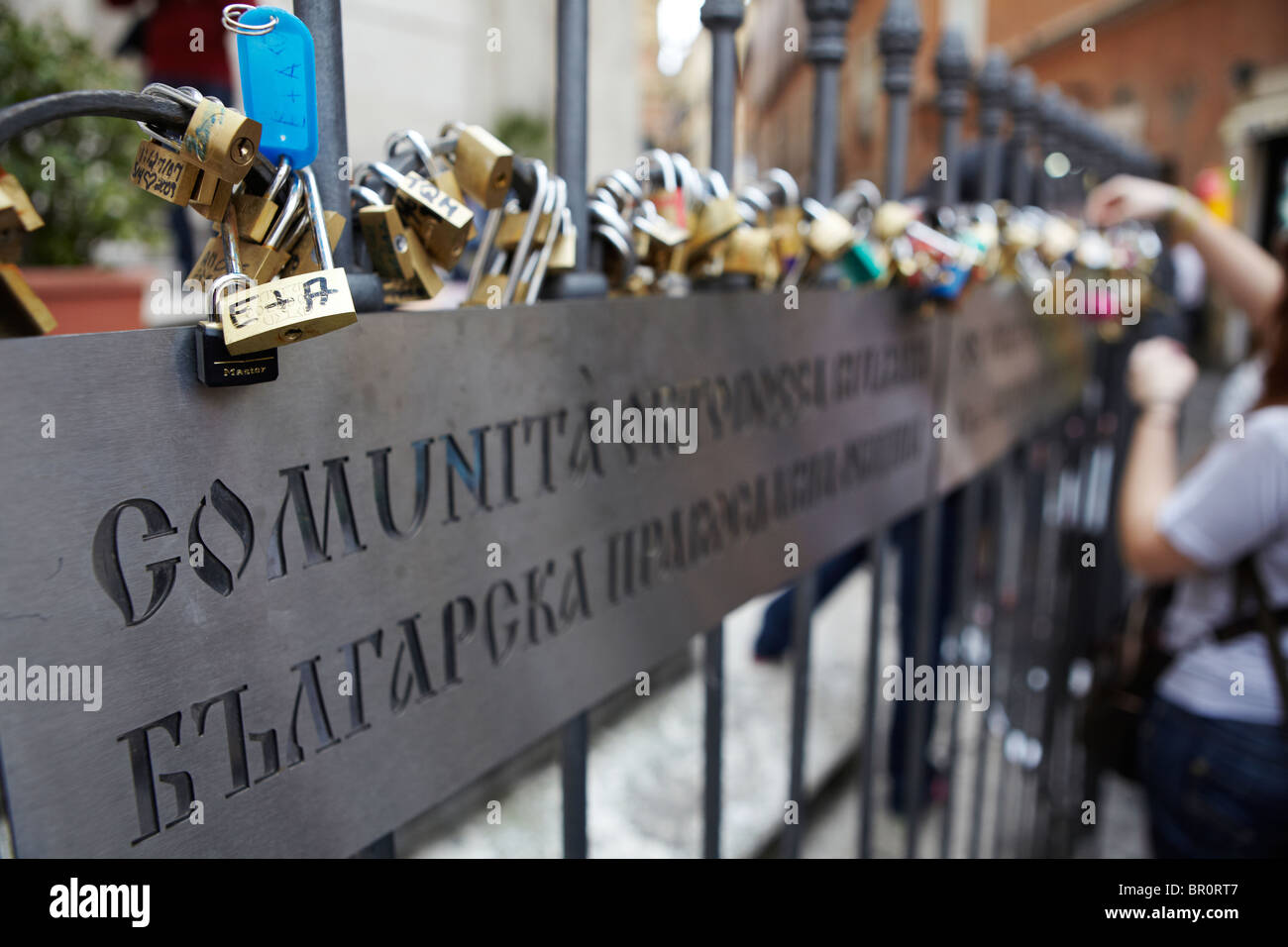 Locks of love on church railings in Rome, Italy Stock Photo