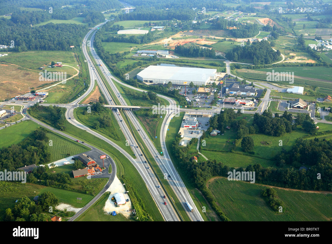 Aerial view of commercial growth clustered around an interstate exit near Hendersonville, NC. Stock Photo