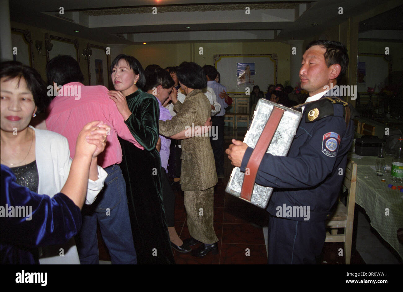 Musician during a banquet Kharkhorin Mongolia mongolie Mongolie traditional dress native people Stock Photo